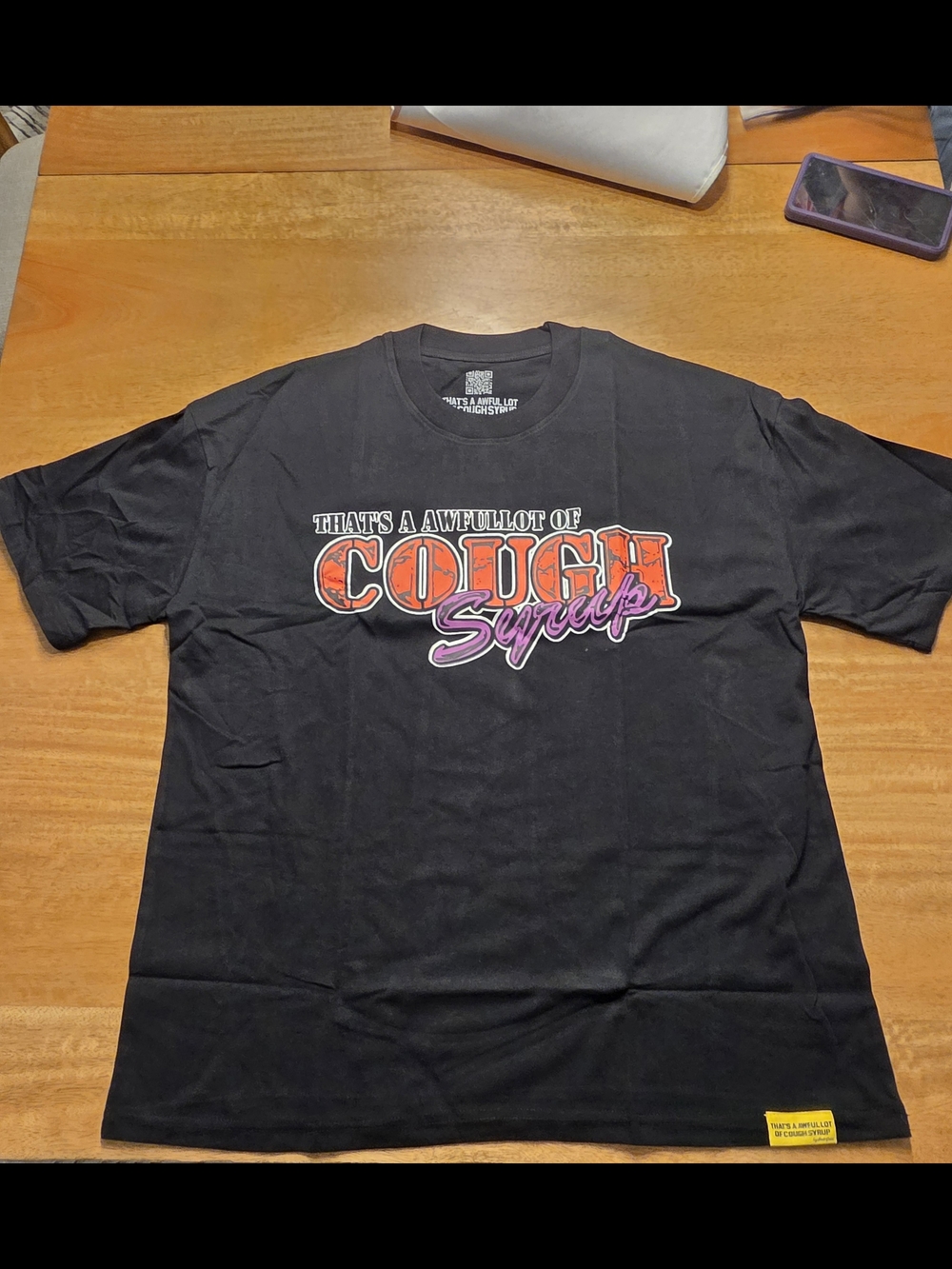 Black Graphic Short-Sleeve Tee with 'Cough Syrup' Script